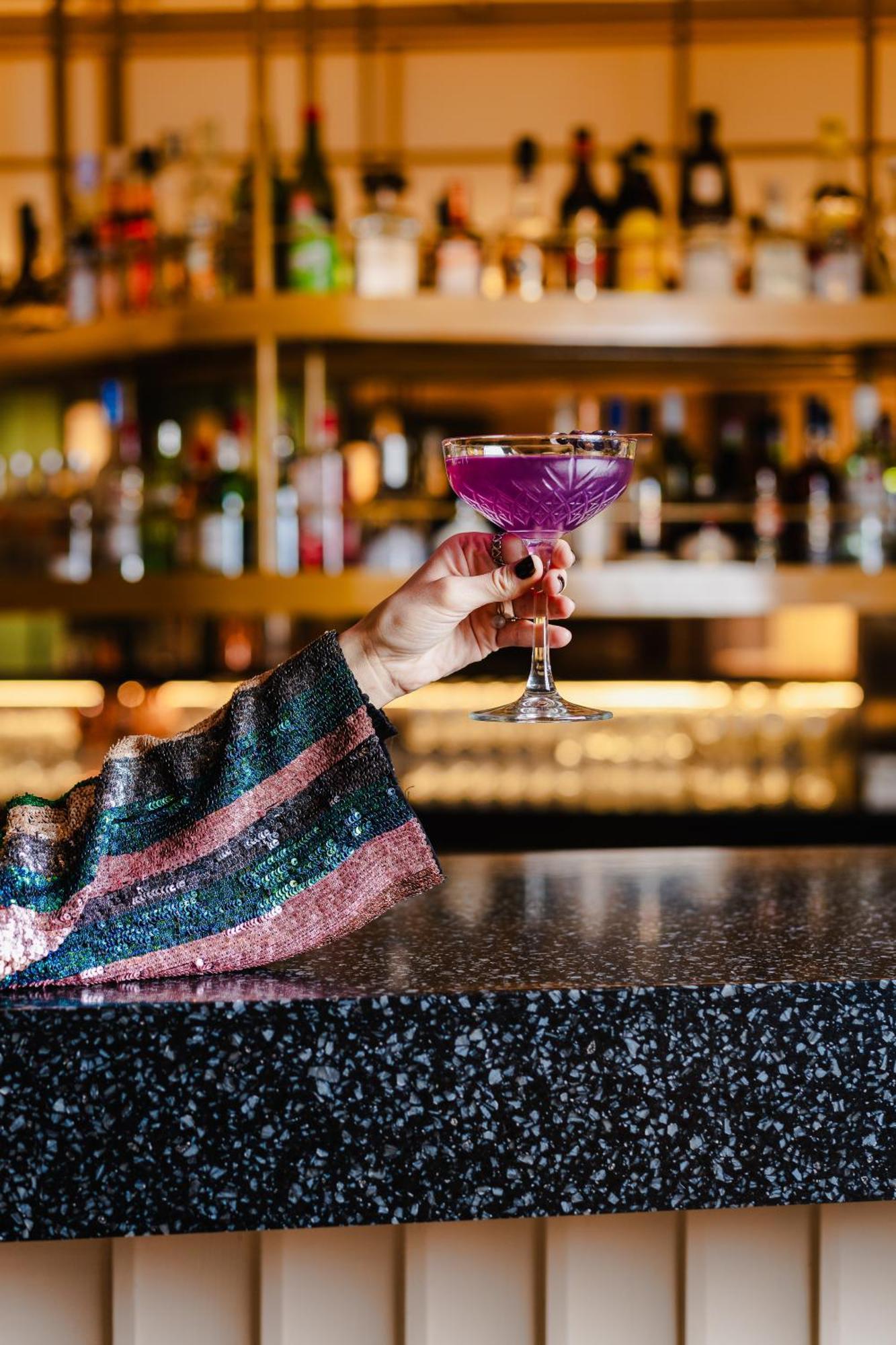 Pullman Santiago El Bosque Hotel Bagian luar foto A purple cocktail